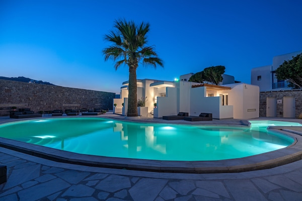 Seasonal outdoor pool, pool umbrellas, pool loungers