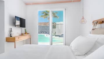 Deluxe Suite, Pool View | Egyptian cotton sheets, premium bedding, down duvets, Tempur-Pedic beds