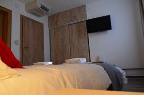 Blackout curtains, free WiFi, bed sheets