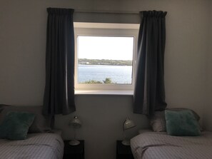 2 quartos, ferros/tábuas de passar roupa, Wi-Fi de cortesia