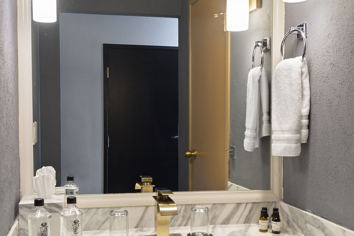 luxury | bathroom | combined shower/bathtub, deep-soaking bathtub, hydromassage showerhead