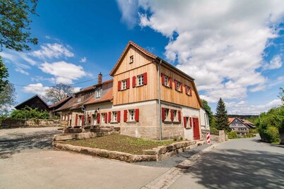 Ultra-modern in old walls, view of the stork's nest