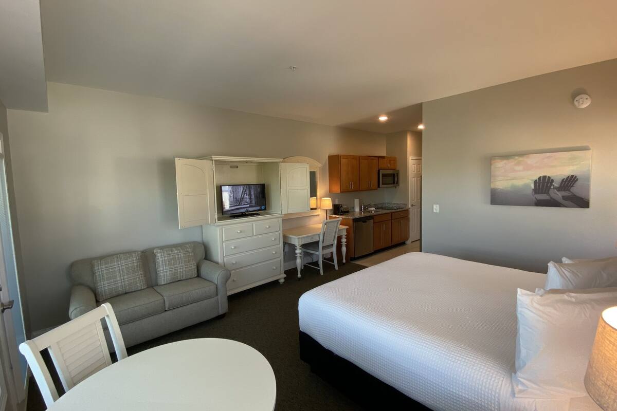 Premium bedding, pillow-top beds, desk, laptop workspace
