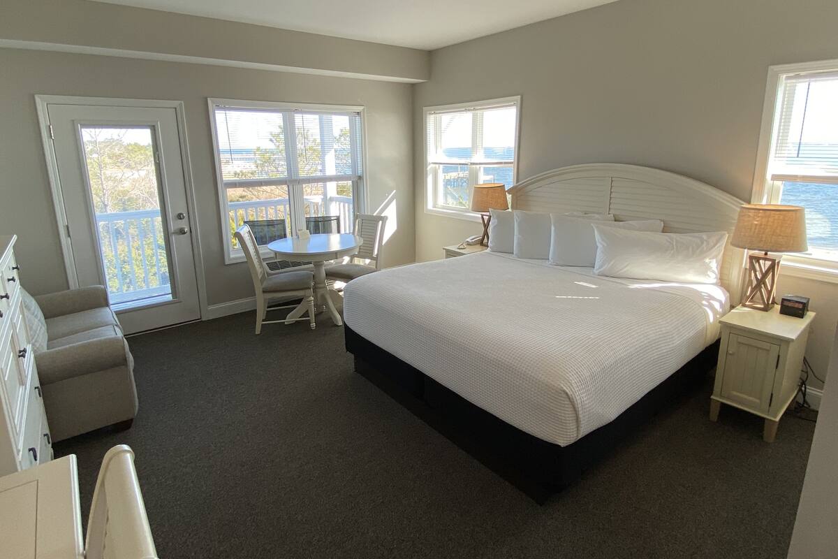Premium bedding, pillow-top beds, desk, laptop workspace