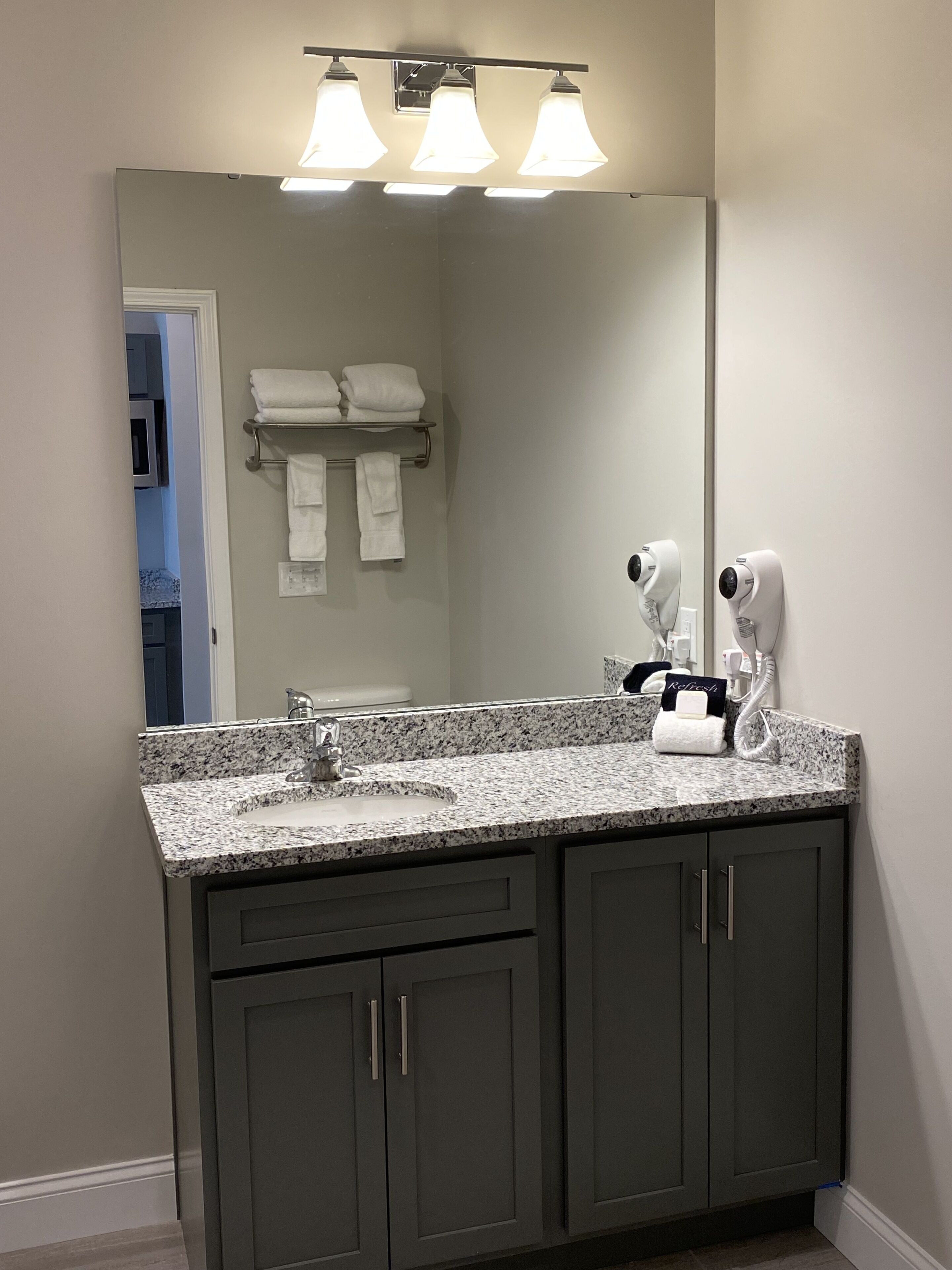 standard studio, 1 bedroom, kitchenette, pool view | bathroom | free toiletries, hair dryer, towels, shampoo