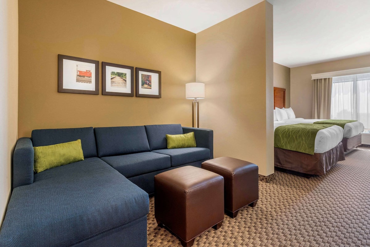 Pillow-top beds, desk, blackout curtains, iron/ironing board