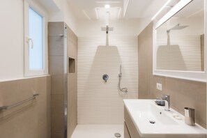 Hair dryer, towels, soap, shampoo