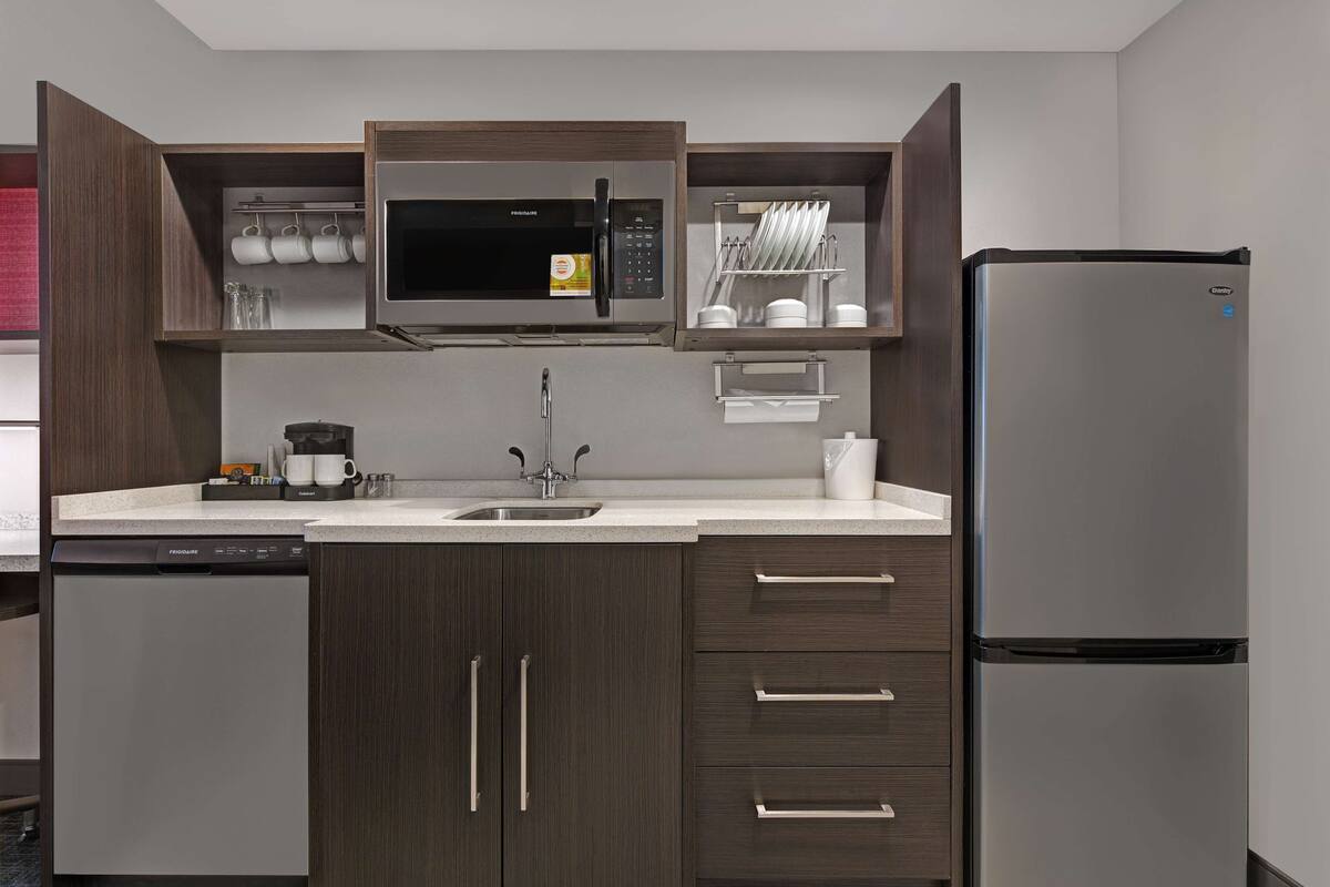 full-sized fridge, microwave, dishwasher, coffee/tea maker