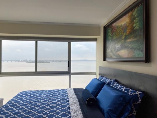 Renovated Luxury Suite overlooking the Guayas River and all amenities.