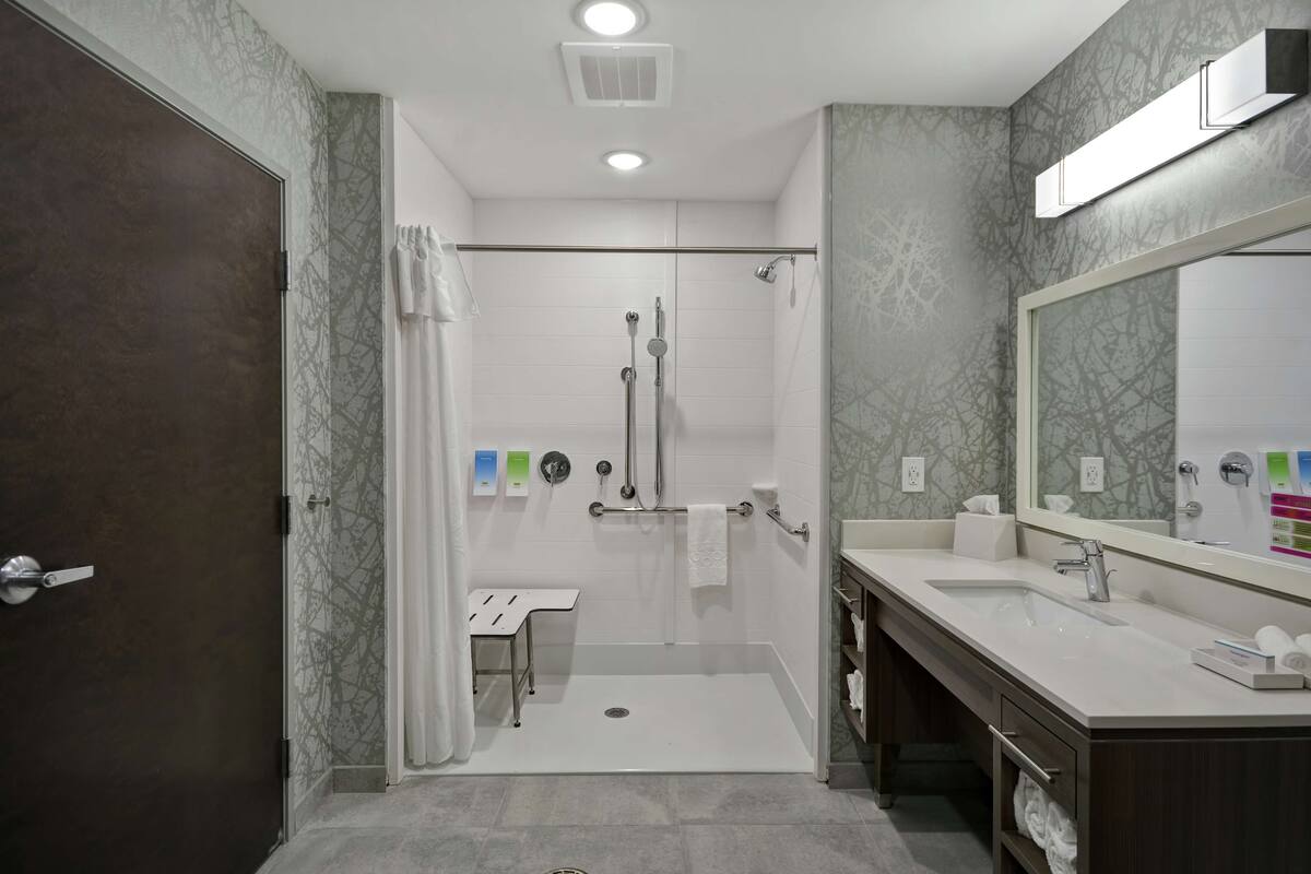 suite, 1 king bed, accessible (roll-in shower) | bathroom shower