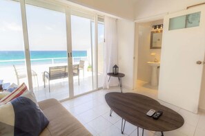 Appartement Deluxe | Coin séjour | Télévision à écran plat