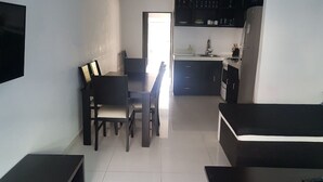 Junior Suite | Private kitchen | Coffee/tea maker, full-size fridge, microwave, oven - New Condo in the Hotel Zone (Cancun)
