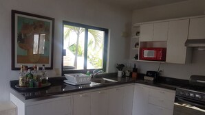 Villa | Private kitchen | Coffee/tea maker, full-sized fridge, microwave, oven - Ocean Front Villa Hotel Zone (Cancun)