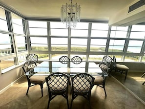 Dining - Beachfront 2BR, 2BA condo with heated pool, Wi‑Fi, and beach access. (Marco Island)