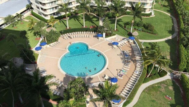 Unclassified image, 1 of 20, button - Beachfront 2BR, 2BA condo with heated pool, Wi‑Fi, and beach access. (Marco Island)