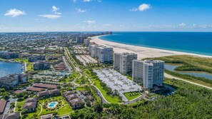 Aerial view - Beachfront 2BR, 2BA condo with heated pool, Wi‑Fi, and beach access. (Marco Island)