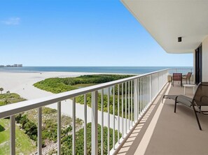 Property grounds - Beachfront 2BR, 2BA condo with heated pool, Wi‑Fi, and beach access. (Marco Island)
