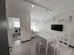 Comfort Apartment | Living area | 32-inch Smart TV with cable channels, TV