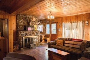 TV, fireplace - Vintage 1940s Lakefront Cabin in McCall (McCall)