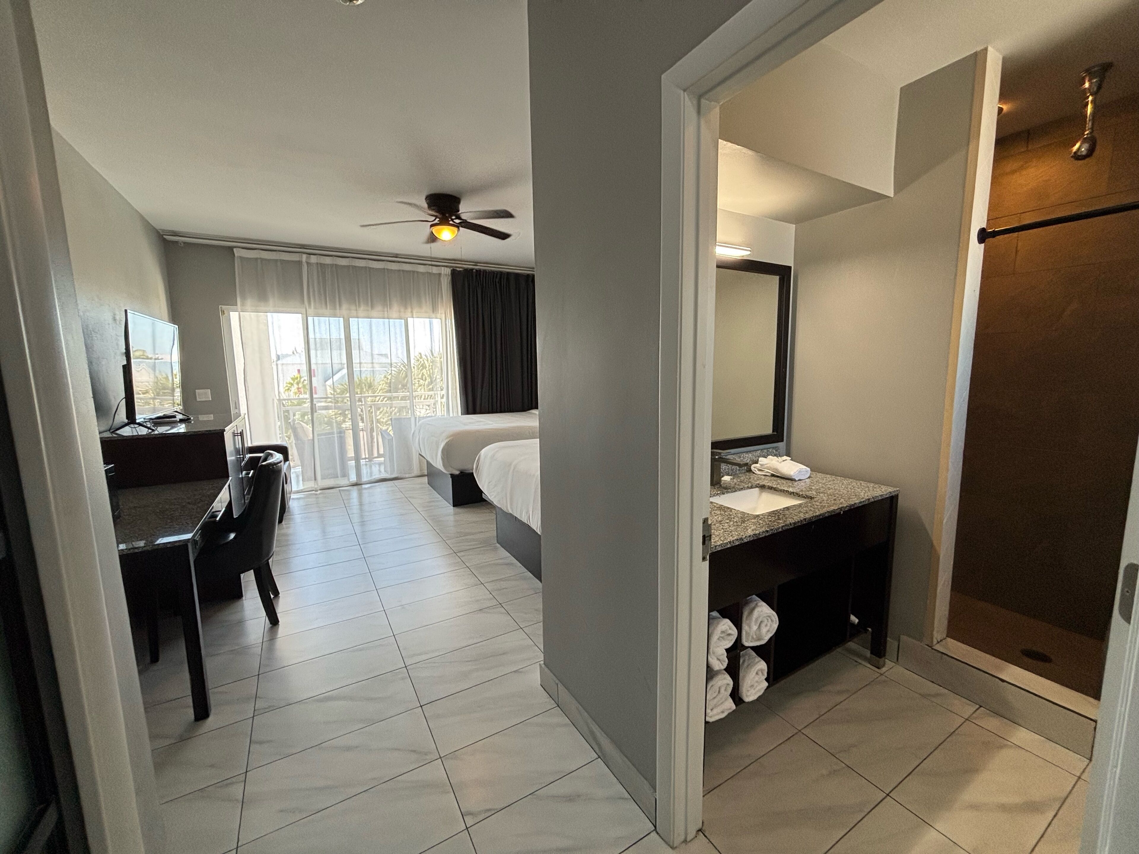 family room, 2 queen beds, balcony, pool view | 1 bedroom, hypo-allergenic bedding, in-room safe, desk