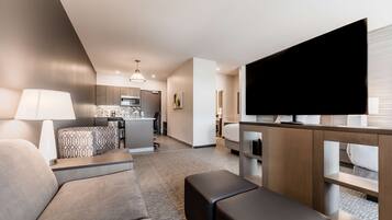 Premium bedding, down comforters, pillowtop beds, in-room safe