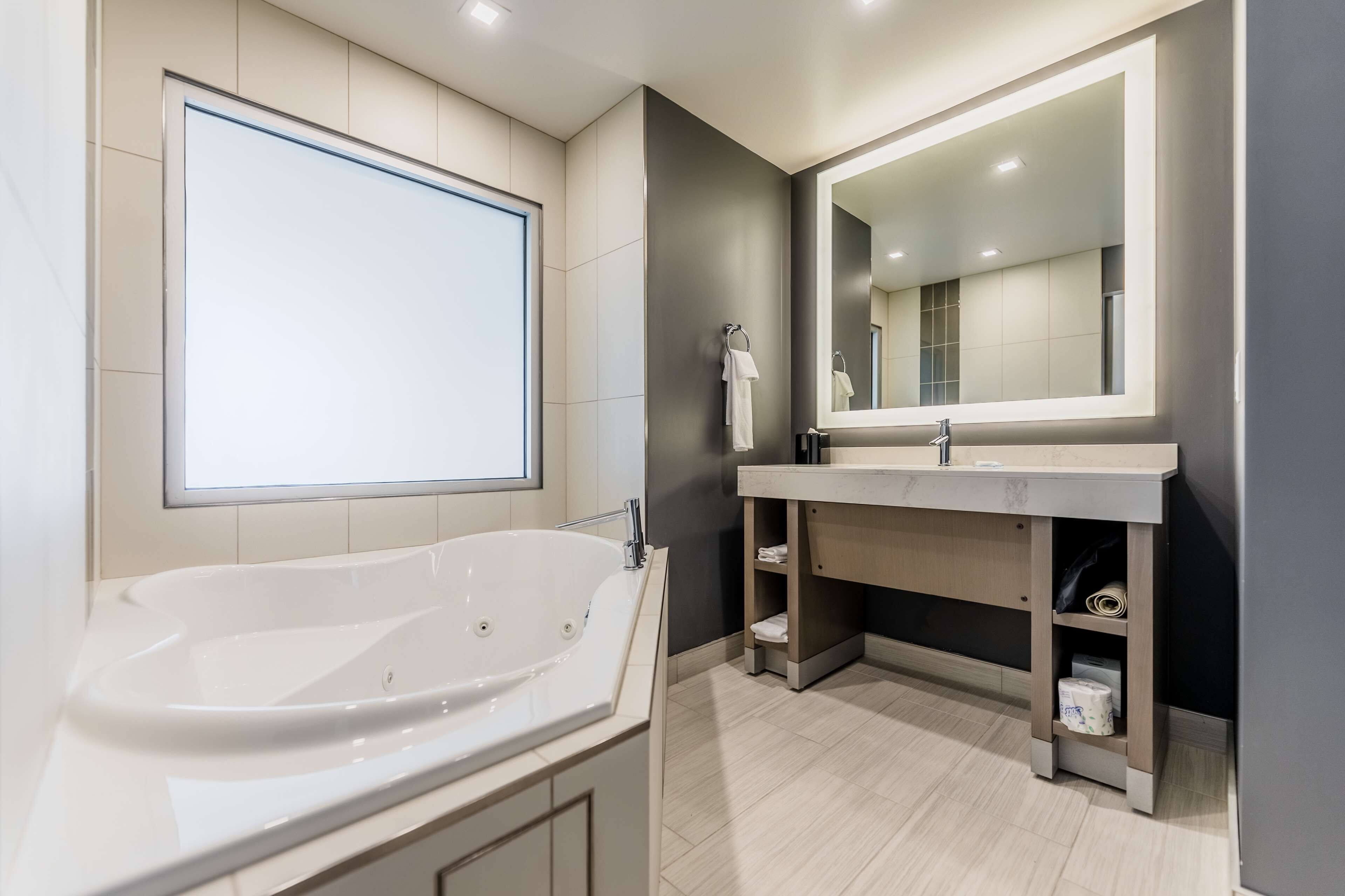 room, 1 king bed (den, spa) | bathroom | designer toiletries, hair dryer, towels, soap
