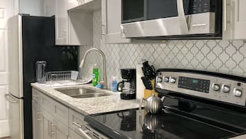 Apartment | Private kitchen | Full-size fridge, microwave, oven, stovetop