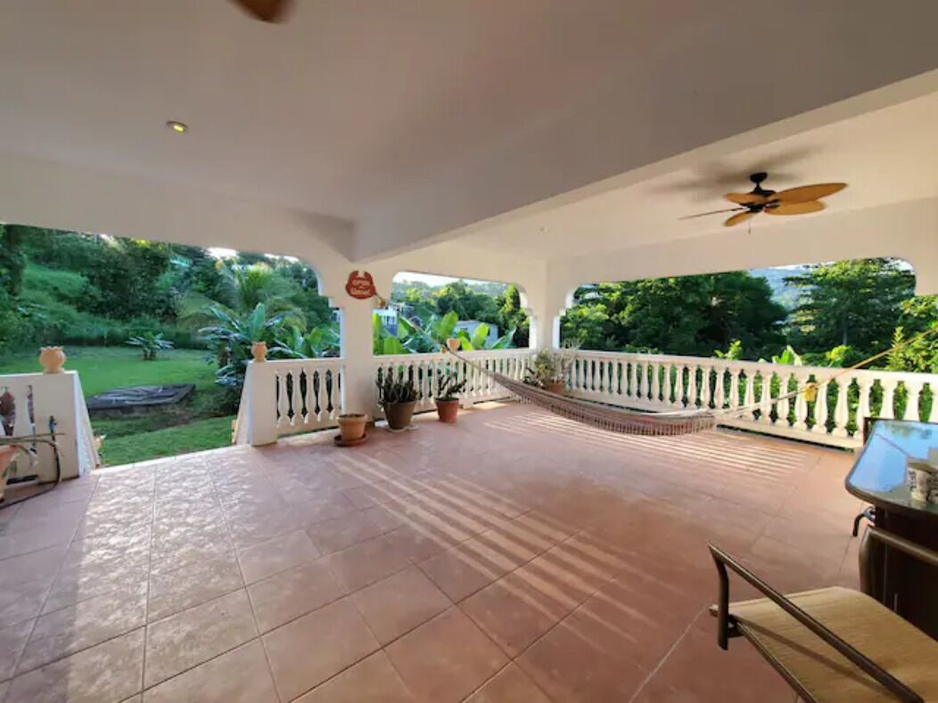 Verandah with hammock and view of El Yunque