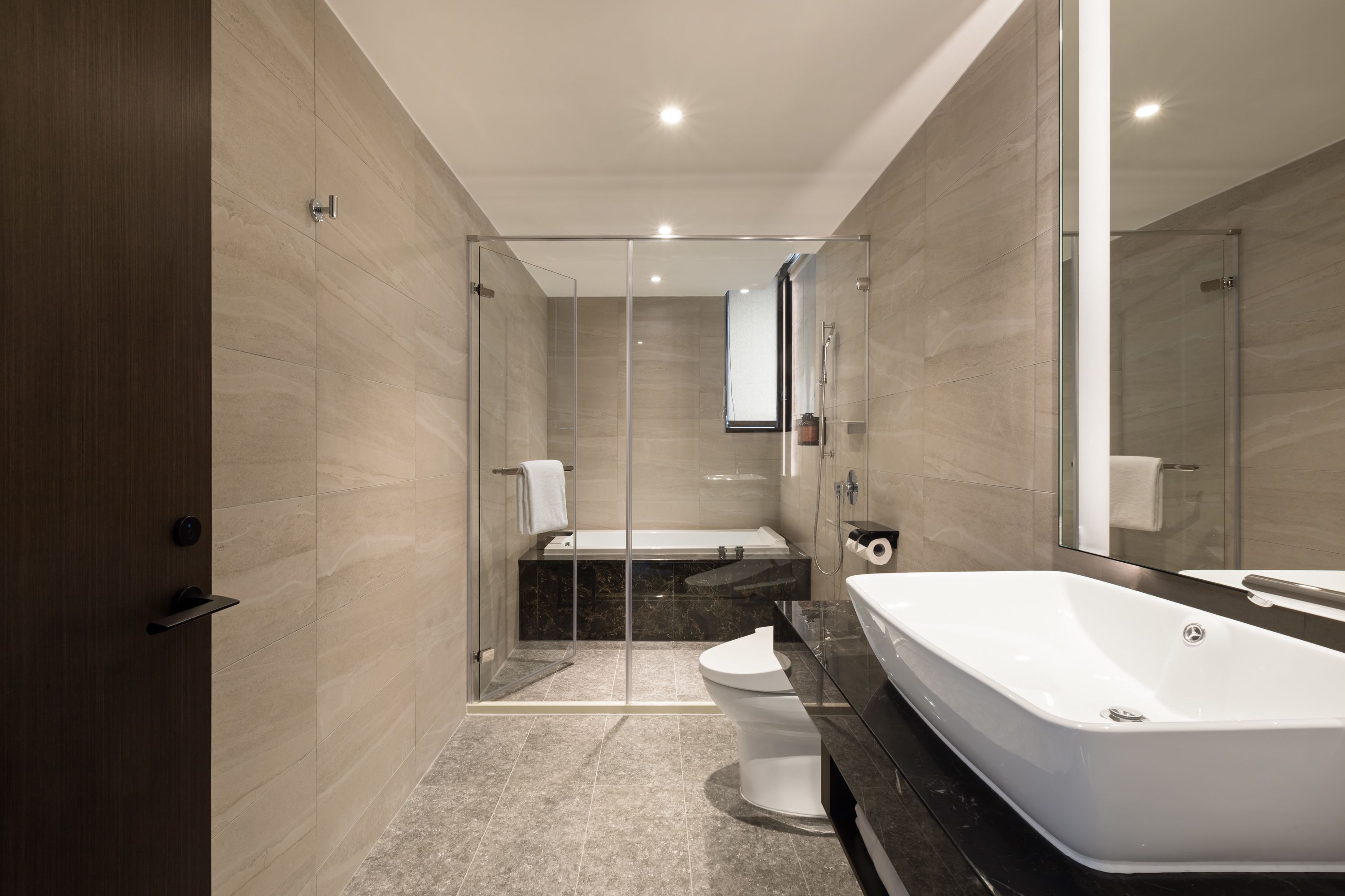 lakeshore suite | bathroom | hair dryer, slippers, bidet, towels