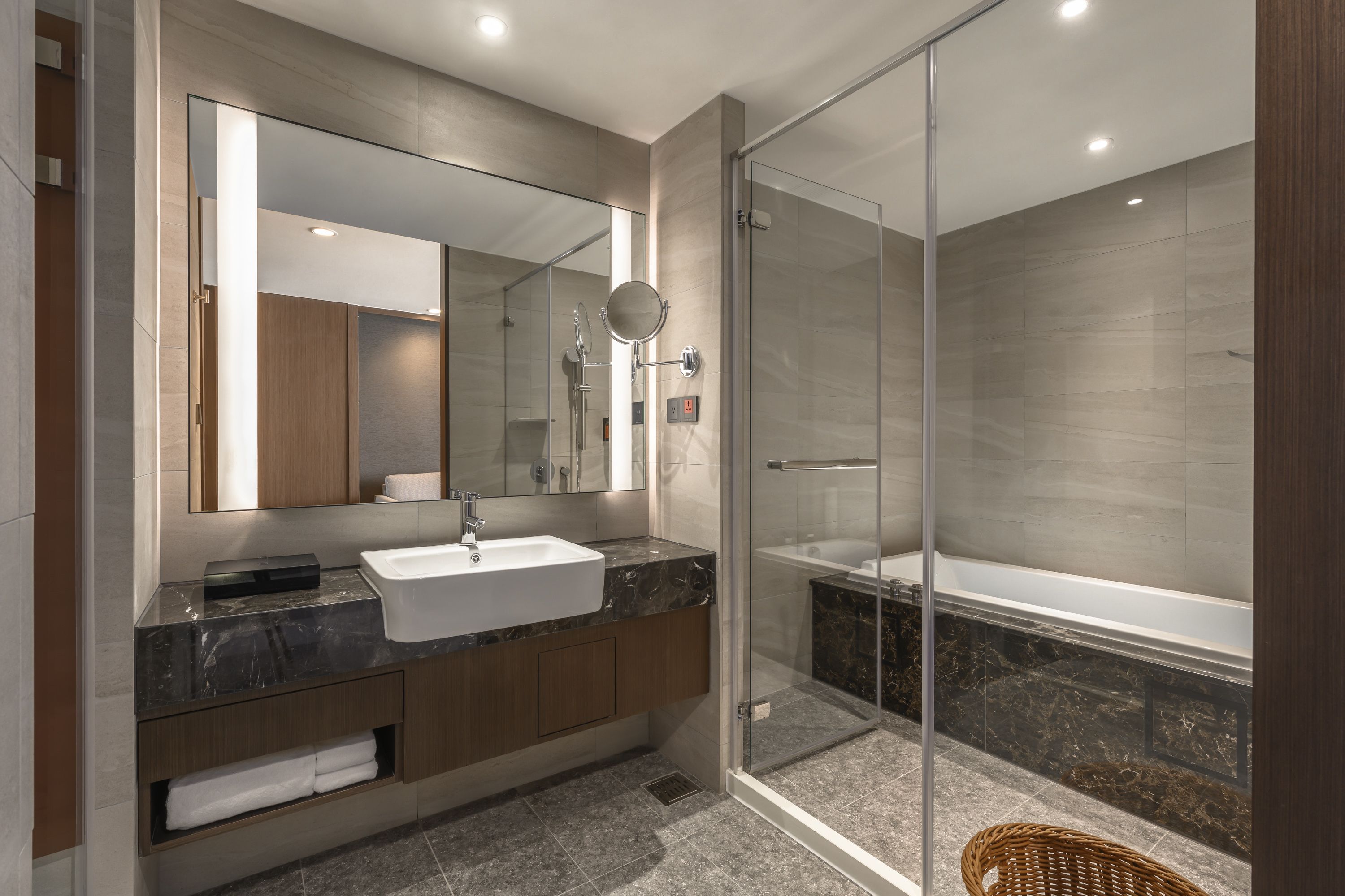 premium suite | bathroom | hair dryer, slippers, bidet, towels