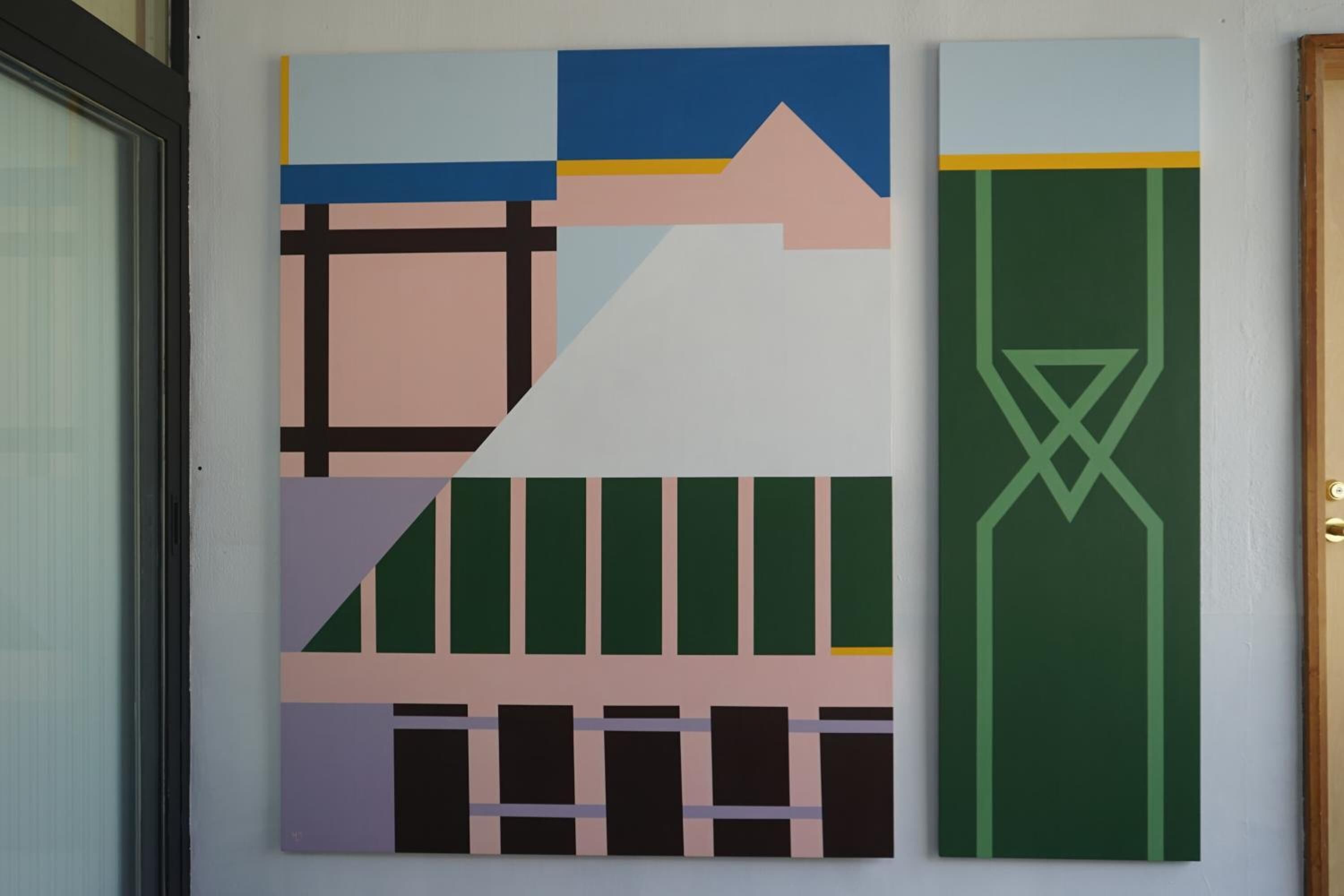 A wall with three abstract paintings.