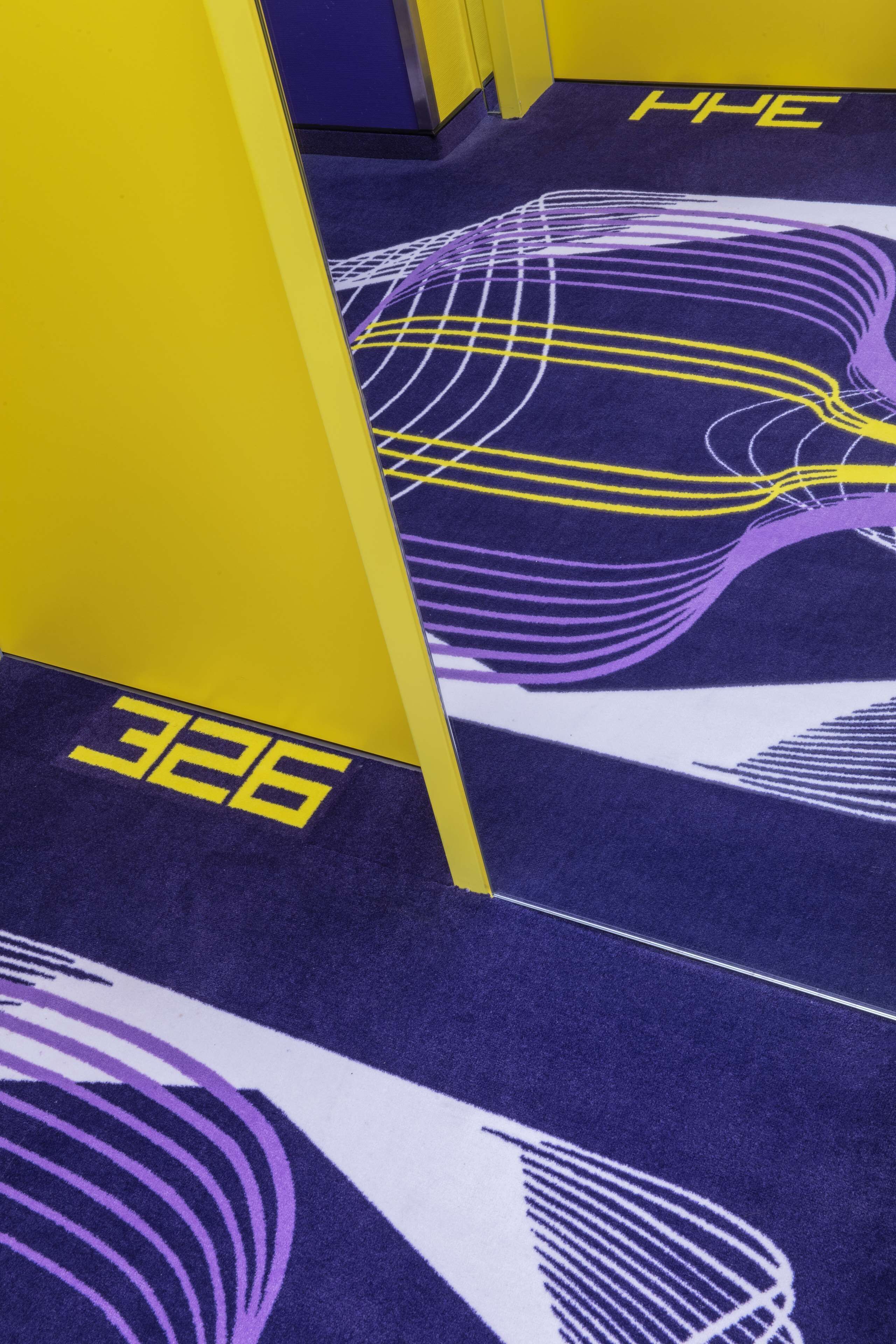 A carpet with a geometric pattern and the number 326.