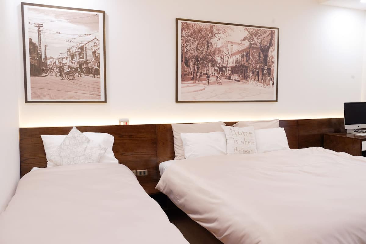 Kamar Triple Keluarga | Meja kerja, ruang kerja ramah laptop, dan tempat tidur lipat/tambahan