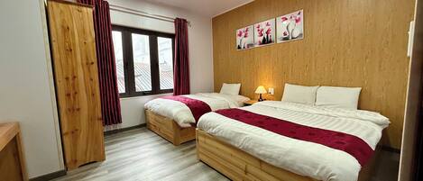 Desk, laptop workspace, free WiFi, bed sheets