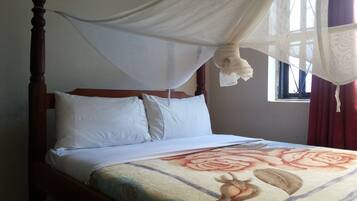 Deluxe Double Room | Pillow-top beds, individually furnished, desk, laptop workspace