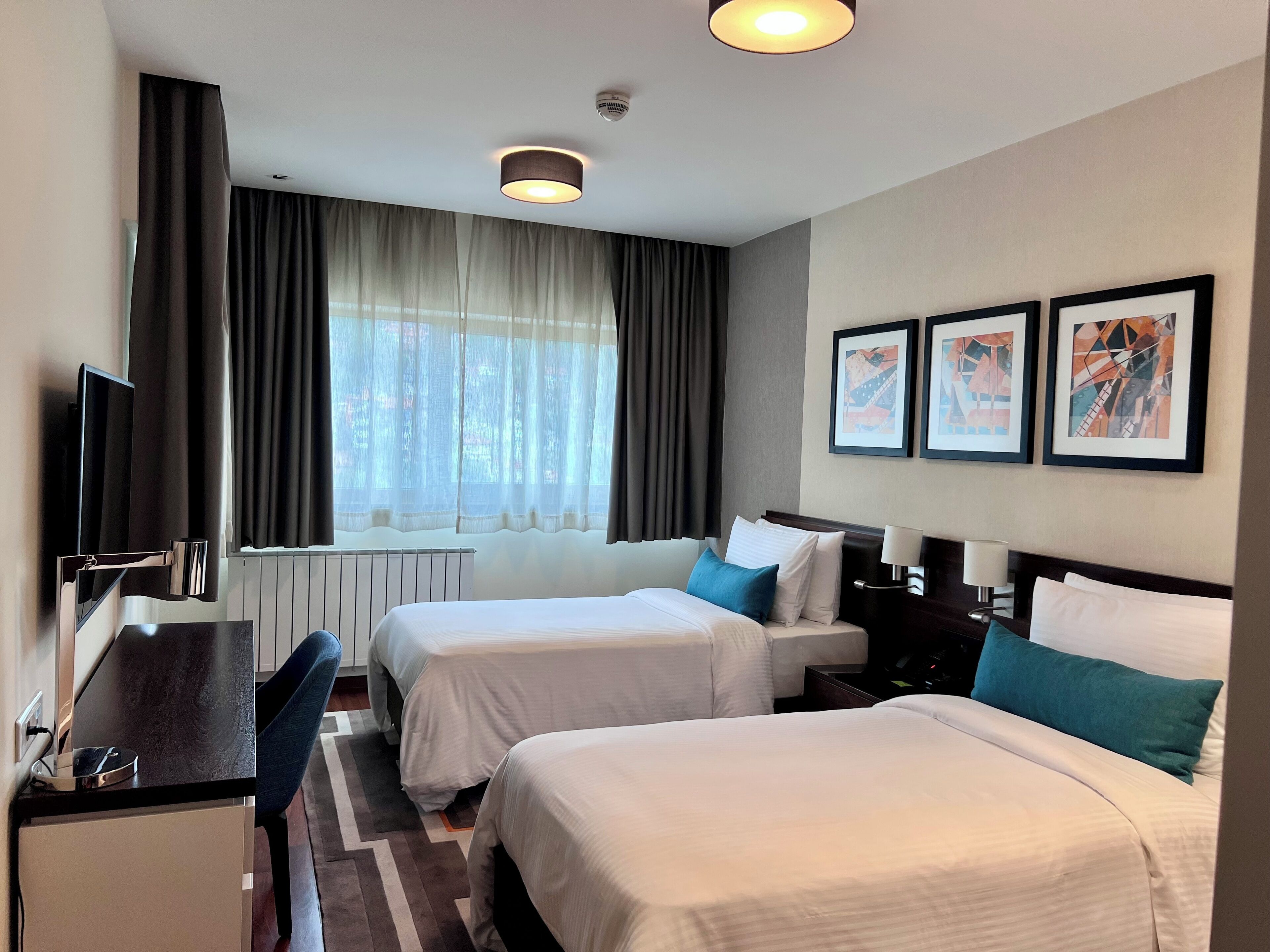 Apartment, 3 Bedrooms (Spacious) | Hypo-allergenic bedding, down duvets, in-room safe, desk