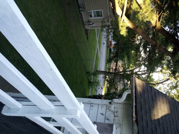 Stunning residential scene with a traditional house and well-manicured lawn.