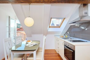 Apartamento urbano (1 Bedroom) | Cozinha privada | Geladeira, fogão, cooktop, cafeteira/chaleira