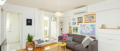 City Apartment, Balcony (2 Bedrooms) | Living room | Flat-screen TV