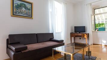 Departamento Confort, Terraza (3 Bedrooms) | Área de sala de estar | Televisión de pantalla plana