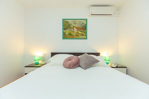 Apartamento (2 Bedrooms) | 2 quartos, ferros/tábuas de passar roupa, Wi-Fi de cortesia