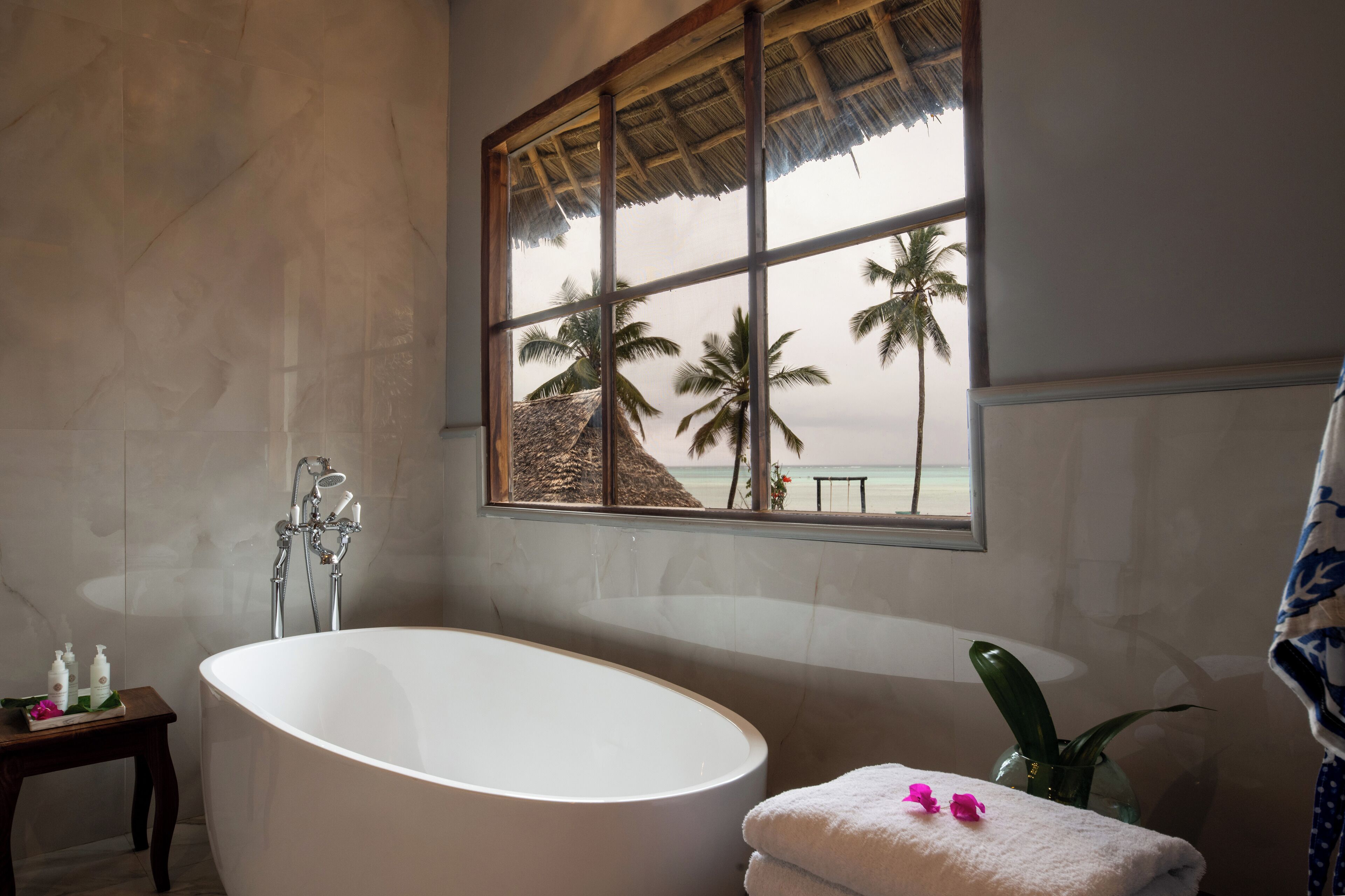 luxury studio suite, 1 king bed, balcony, sea view | bathroom | hair dryer, bathrobes, towels, soap