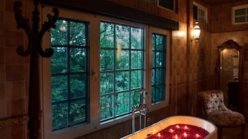 Separate bathtub and shower, hair dryer, bathrobes, slippers