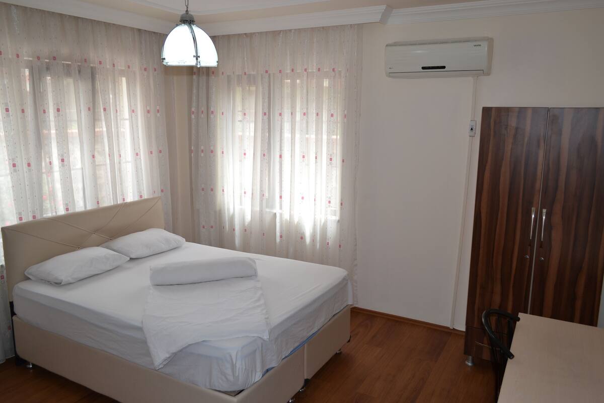 Family Apartment, 3 Bedrooms, Non Smoking, Refrigerator | In-room safe, desk, laptop workspace, blackout drapes
