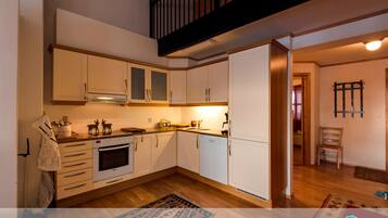 Apartment, 3 Bedrooms | Private kitchen | Full-sized fridge, oven, stovetop, dishwasher