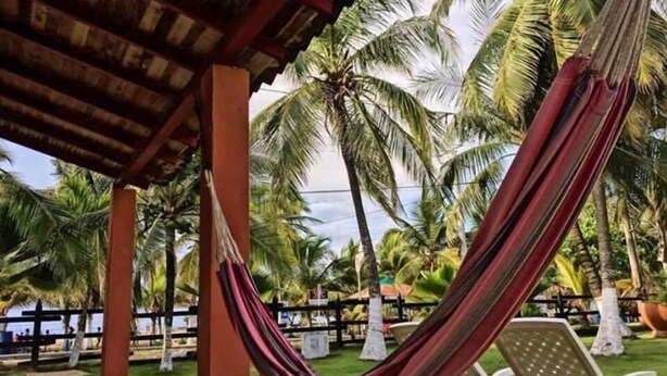 Cabin, Multiple Beds, Kitchen | WiFi (free), bed sheets - Cabañitas del Mar by Rotamundos (Coveñas)
