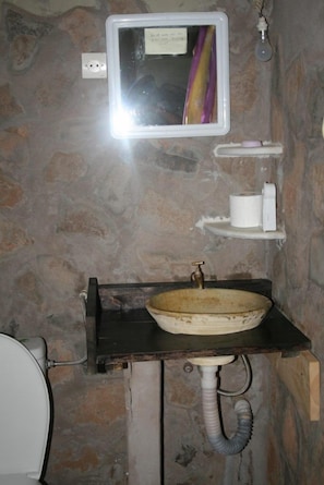 Shower, rainfall showerhead, slippers, towels