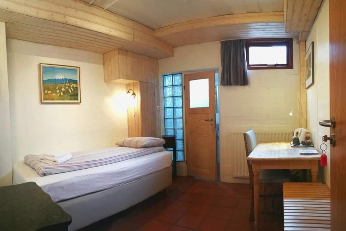 Desk, blackout curtains, free cots/infant beds, free WiFi