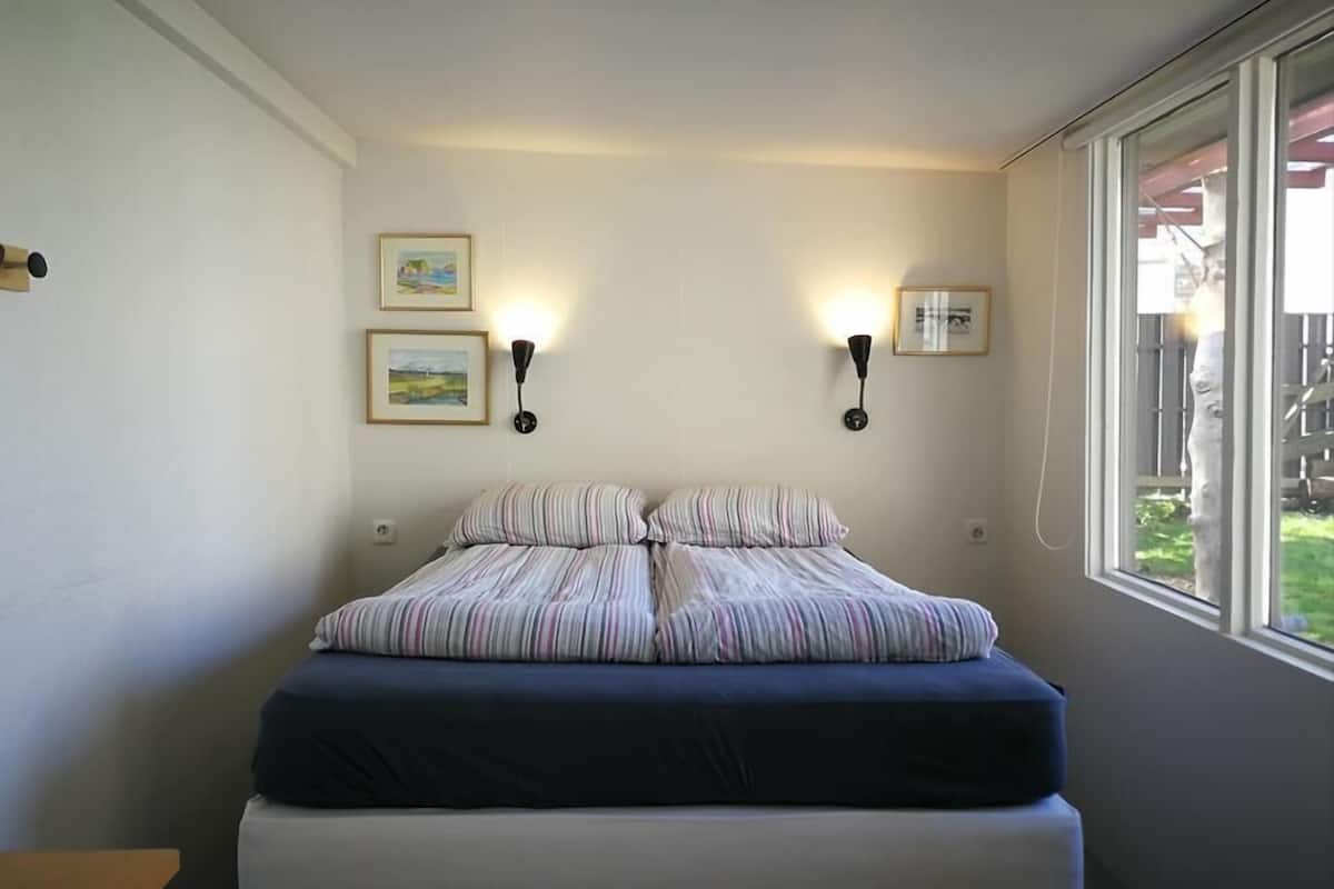Desk, blackout curtains, free cots/infant beds, free WiFi