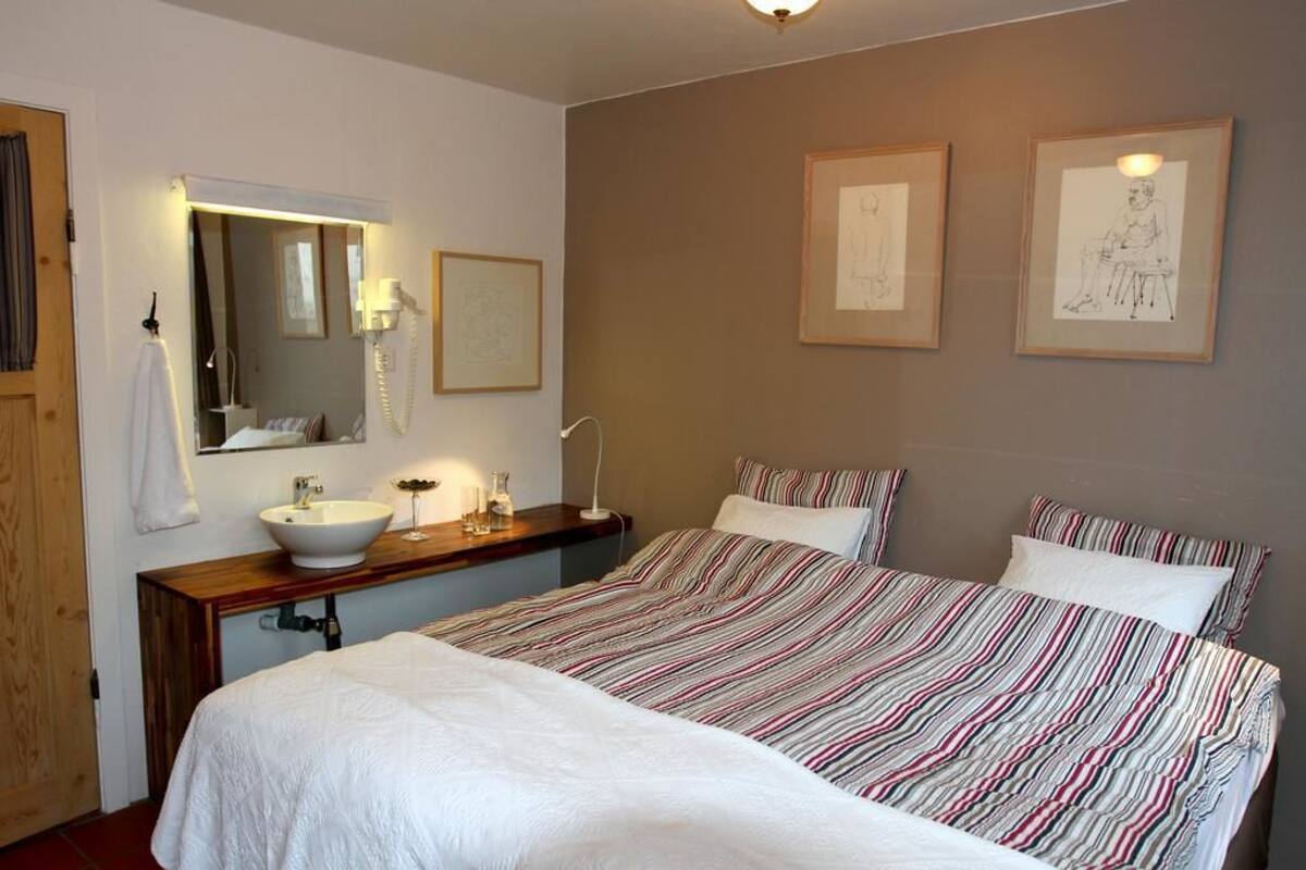Desk, blackout curtains, free cots/infant beds, free WiFi